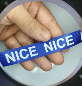 روبان کبریتی سرمه ای با چاپ سفید nice متراژ 1000 متری