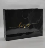 بگ گلاسه براق مشکی 52×36 با چاپ طلاکوب love تیراژ 1000 عددی