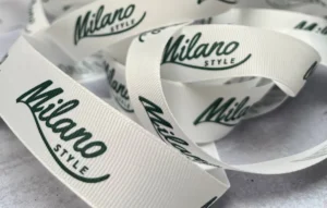 روبان سفید کبریتی 2/5 سانتی متری با چاپ سبز MILANO STYLE متراژ 1000 متری