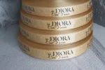 روبان طلایی 2/5 سانتی متری با چاپ مشکی DIORA تیراژ 1000 متری