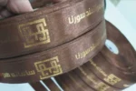 روبان 4 سانتی متری قهوه ای با چاپ طلایی سامانه هوشمند سورن تیراژ 1000 متری