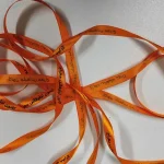 روبان هدایای تبلیغاتی نارنجی با چاپ مشکی