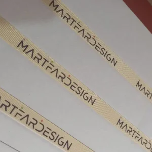 روبان طلایی با چاپ مشکی دیزاین