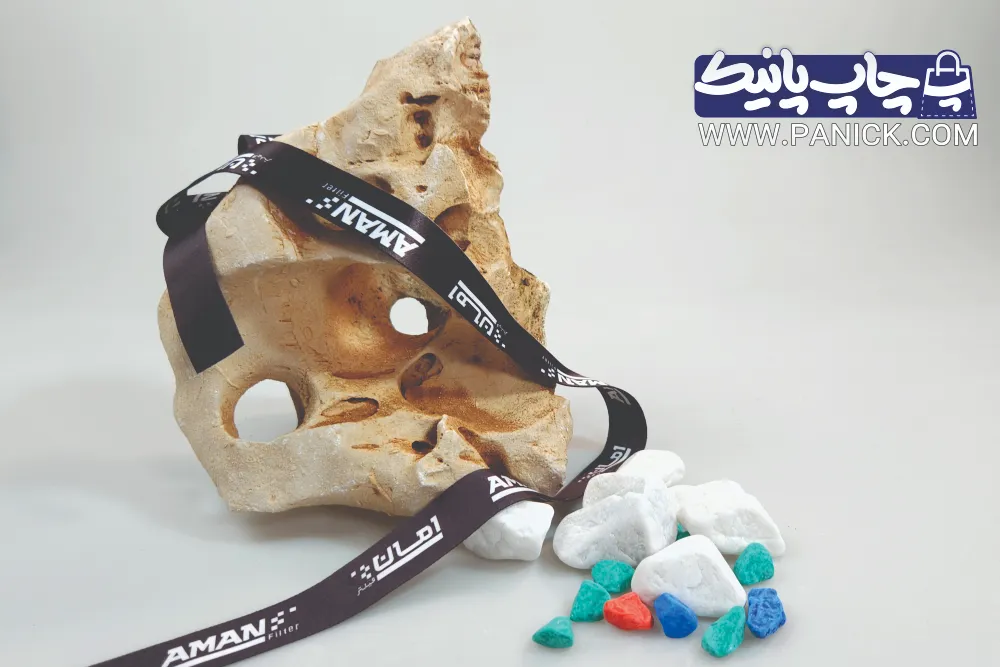 ROBANPANICK-178 روبان مشکی ۲.۵ سانتی با چاپ سفید امان