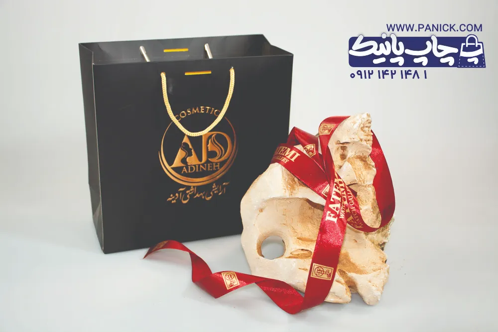 ROBANPANICK-46 روبان زرشکی ساتن 2/5 سانتی با چاپ طلایی