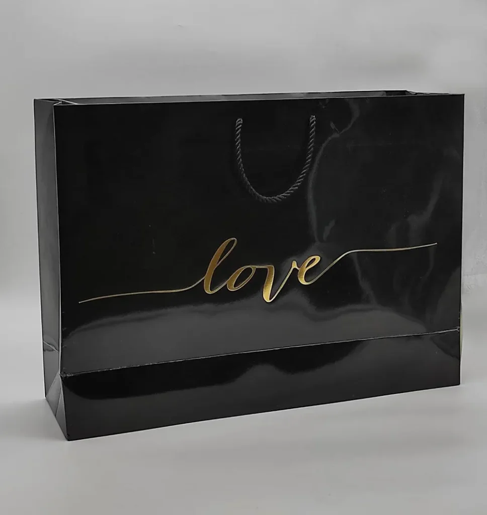 بگ گلاسه براق مشکی 52×36 با چاپ طلاکوب love تیراژ 1000 عددی