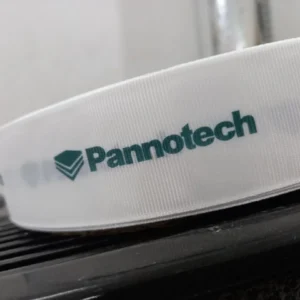 روبان کبریتی سفید عرض 4 سانتی متری با چاپ panootech سبز متراژ 1000 متر
