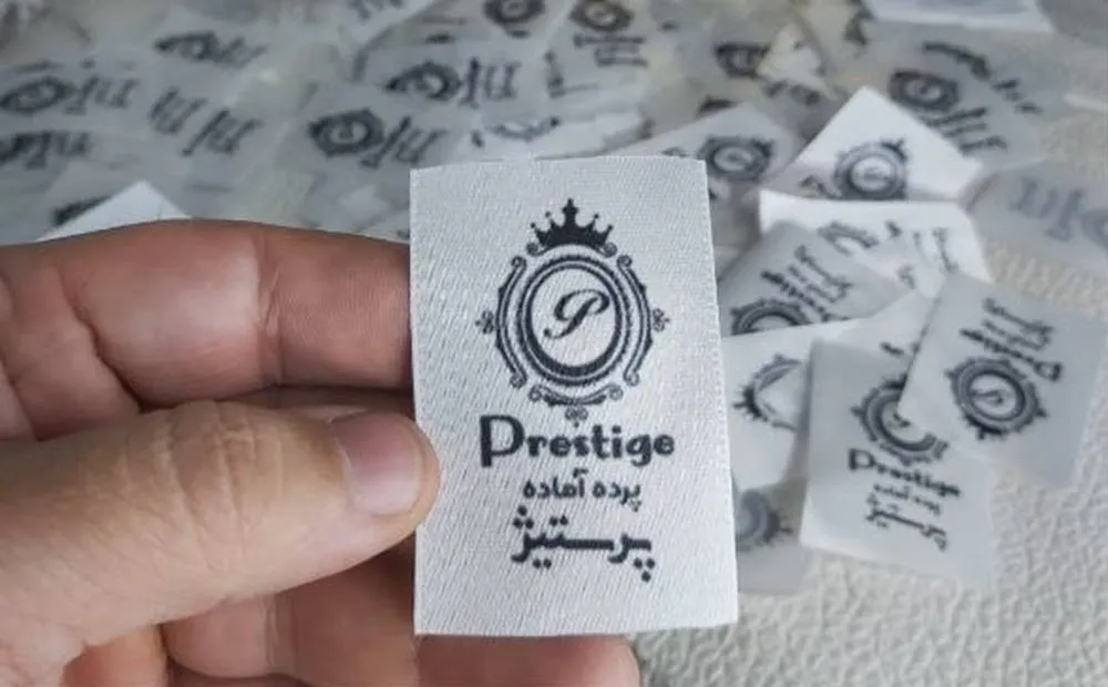 photo_2026-06-11_05-07-07 (2) اتیکت پارچه ای ساتن برند prestige تعداد 1000 عددی