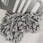سفارش چاپ تگ مقوایی adidas به همراه نخ پلمپ طوسی تیراژ 1000 عددی