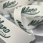 روبان سفید کبریتی 2/5 سانتی متری با چاپ سبز MILANO STYLE متراژ 1000 متری