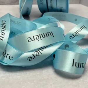 روبان آبی ساتن 2/5 سانتی متری با چاپ مشکی LUMIERE متراژ 1000 عددی