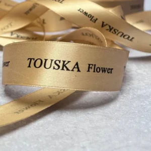 روبان طلایی 2/5 سانتی متری ساتن با چاپ مشکی TOUSKA flower متراژ 1000 متری