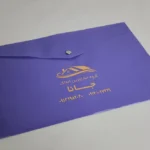 چاپ پوشه دکمه دار طلقی بنفش مشاورین املاک جانا تیراژ 1000 عددی